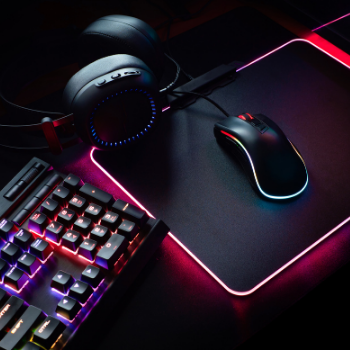 Photo of Mouse, Mouse Pad, and Keyboard.