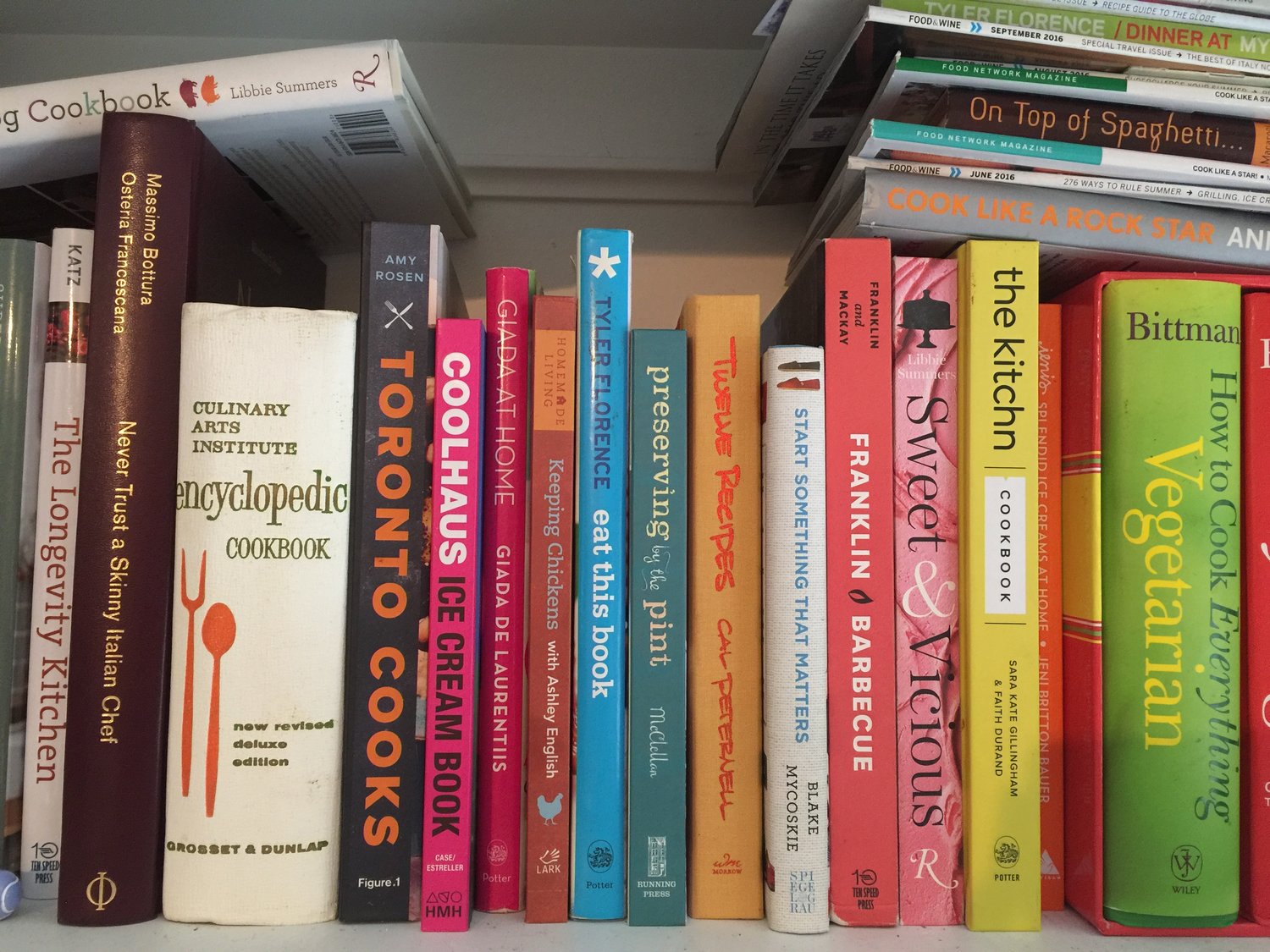 bookshelf of cookbooks