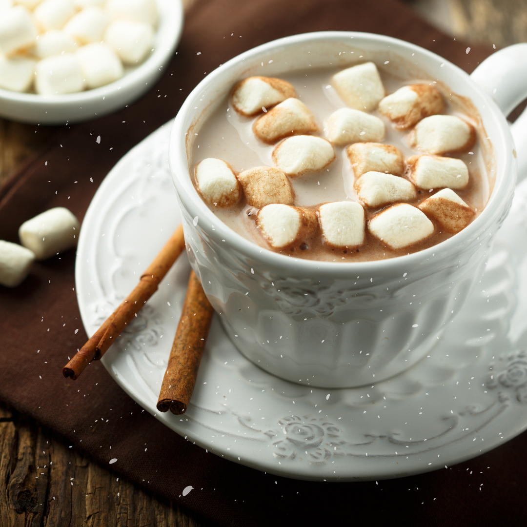 Image of hot cocoa and marshmallows in a mug.
