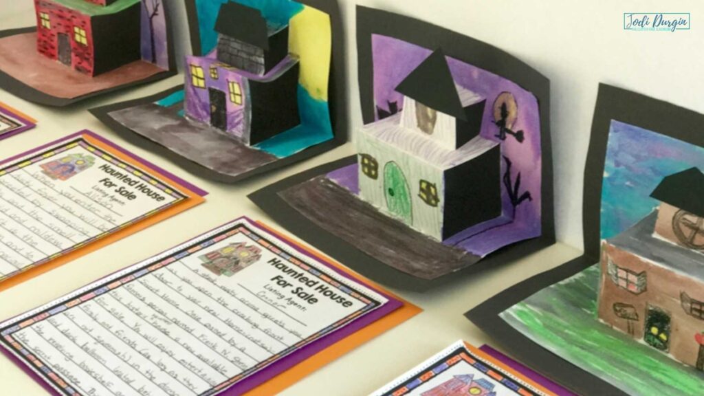 colorful paper pop up houses with writing