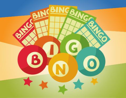 Bingo balls and cards on a colorful background