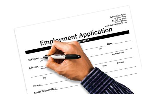Person filling out an employment application