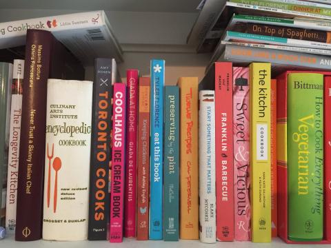 bookshelf of cookbooks