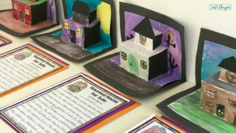 colorful paper pop up houses with writing