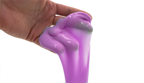 hand holding purple slime