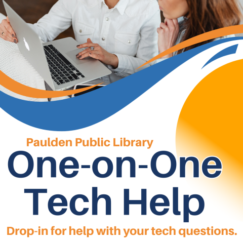 Woman assisting a person on a laptop