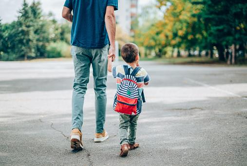 child with backpack