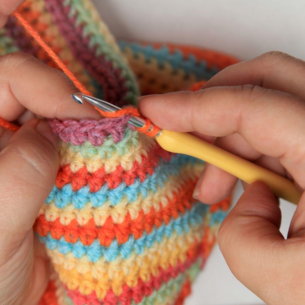 Crocheting with Leslie, photo of hands crocheting