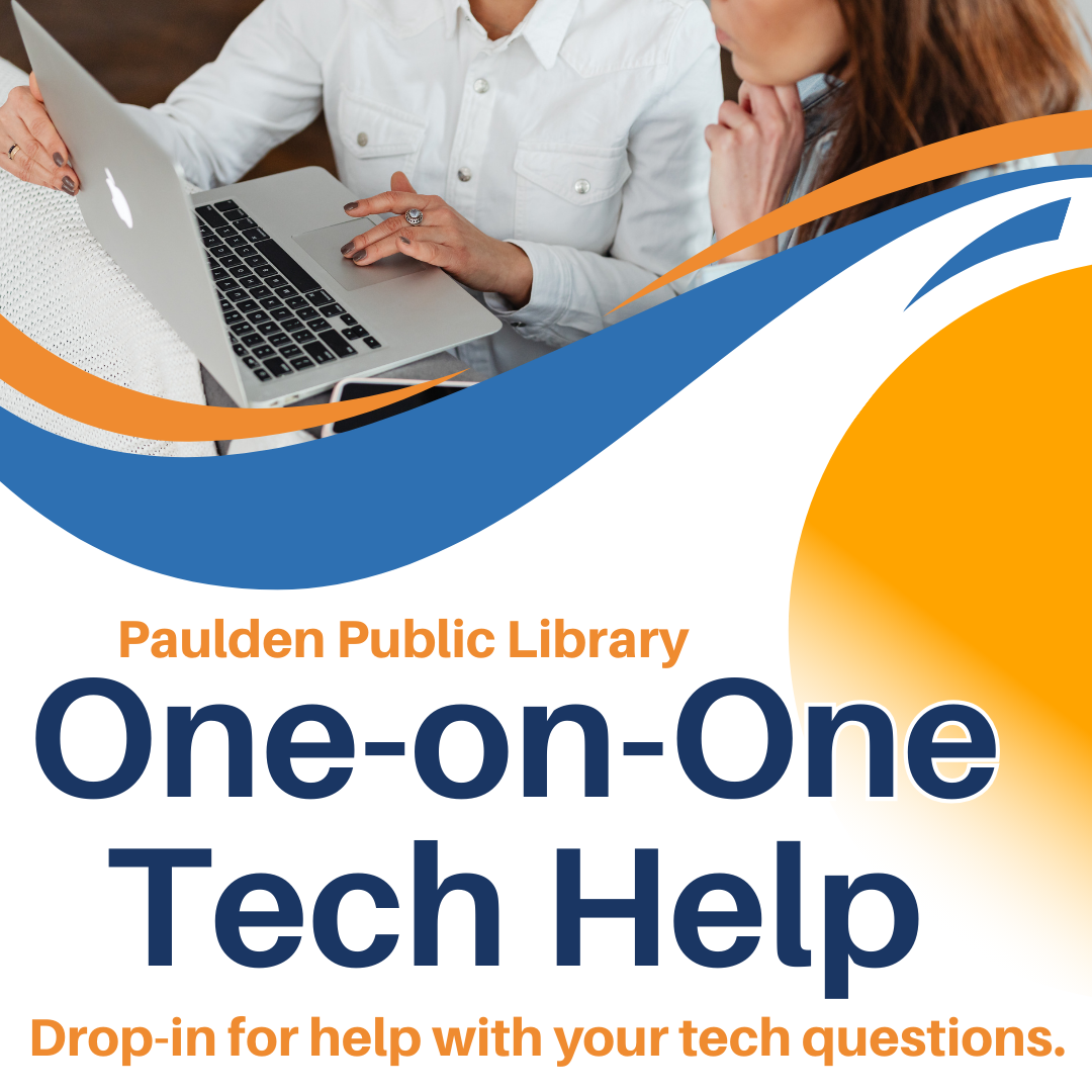 Woman assisting a person on a laptop